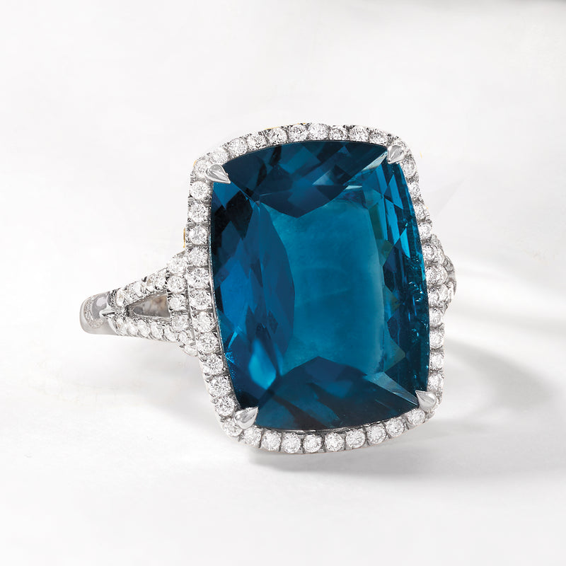 London blue topaz and diamond ring, cushion-cut blue gemstone with full diamond halo, white gold