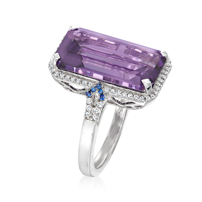 Amethyst and diamond ring with sapphire side stones, emerald-cut purple center, white gold