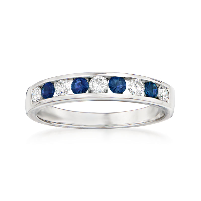 18kt white gold ring with three blue sapphire stones and clear diamond accents
