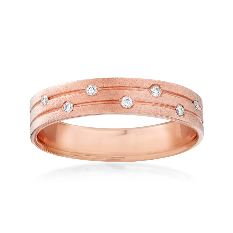 14kt rose gold band ring with small round diamond accents across top