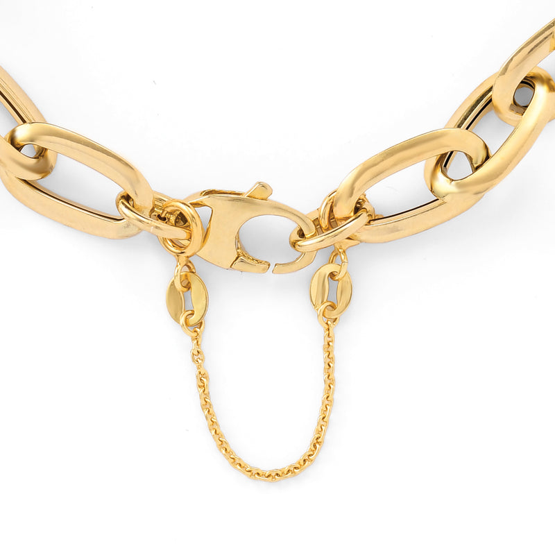 14kt yellow gold safety cable chain attached to oval link bracelet band