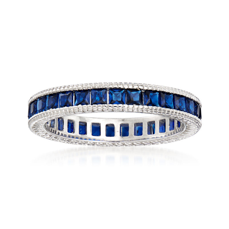 Sterling silver simulated sapphire eternity band with blue square-cut stones