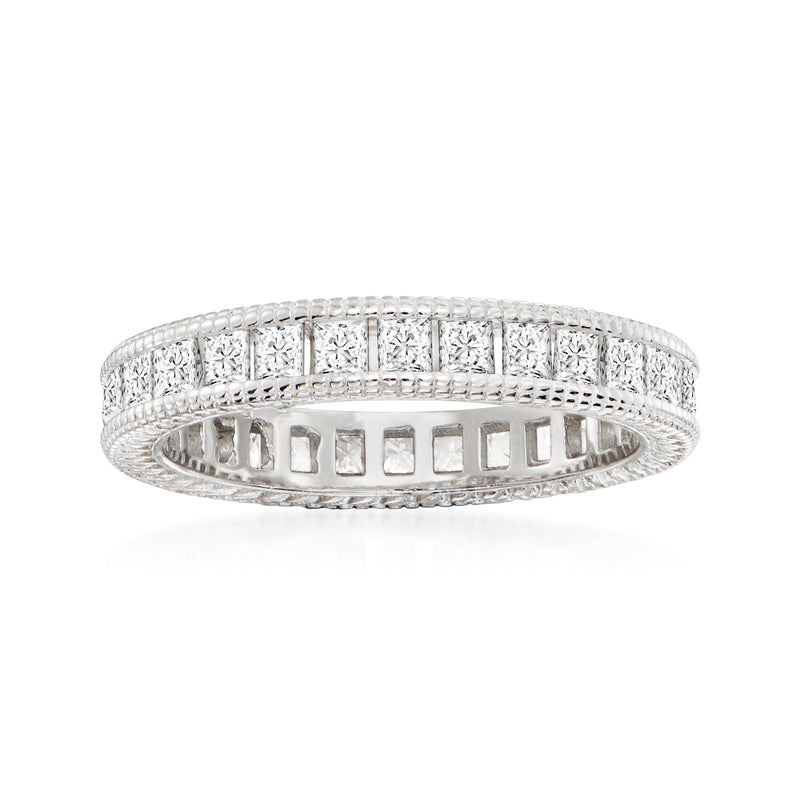 Sterling silver CZ eternity band with rectangular stone accents, round profile
