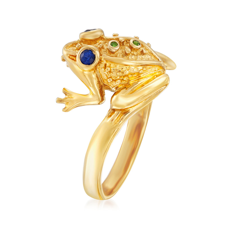 Gold frog cocktail ring with blue eyes and green stones, side view of sculpted band