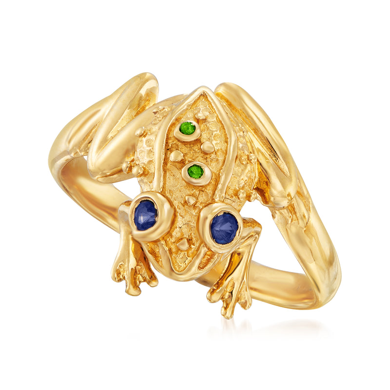 Gold frog ring with blue gemstone eyes and green round accents, open sculpted design