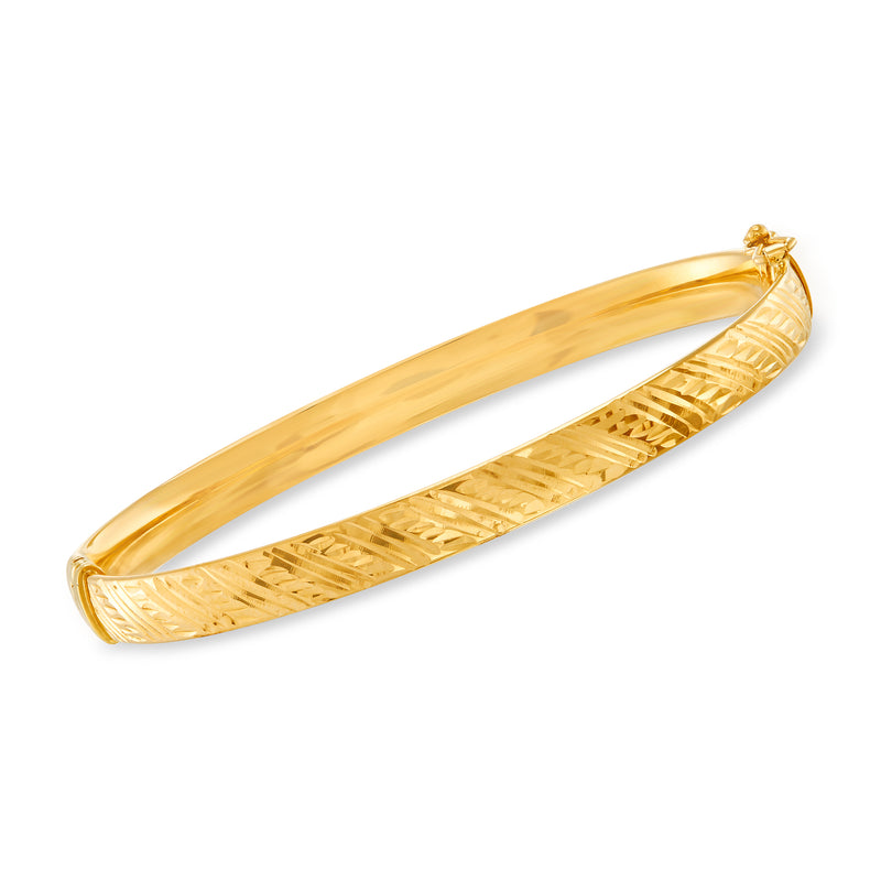 Italian 14k yellow gold bangle bracelet, textured oval pattern and clasp