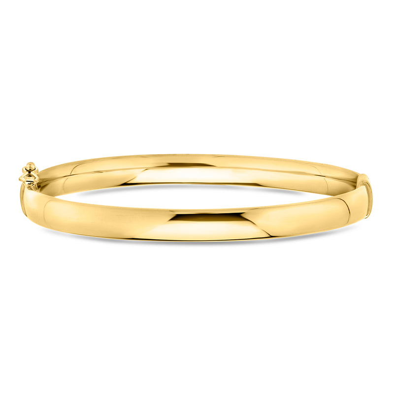 18kt yellow gold bangle bracelet with twisted ridges and clasp detail