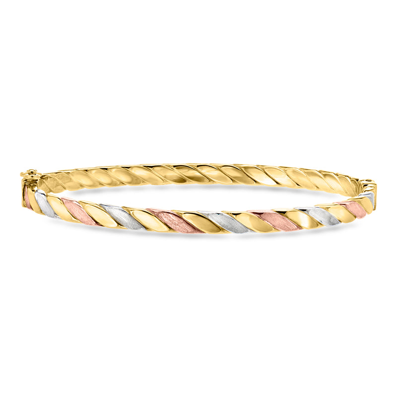 Tri-colored twisted gold bangle with yellow, white, and pink striped accents
