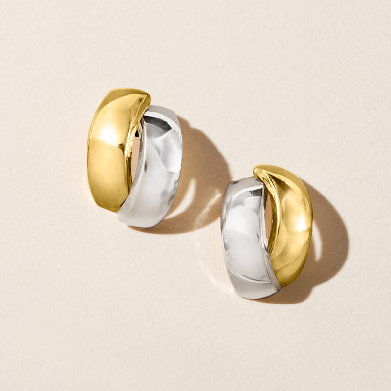 Two-tone curved hoop earrings in gold and silver