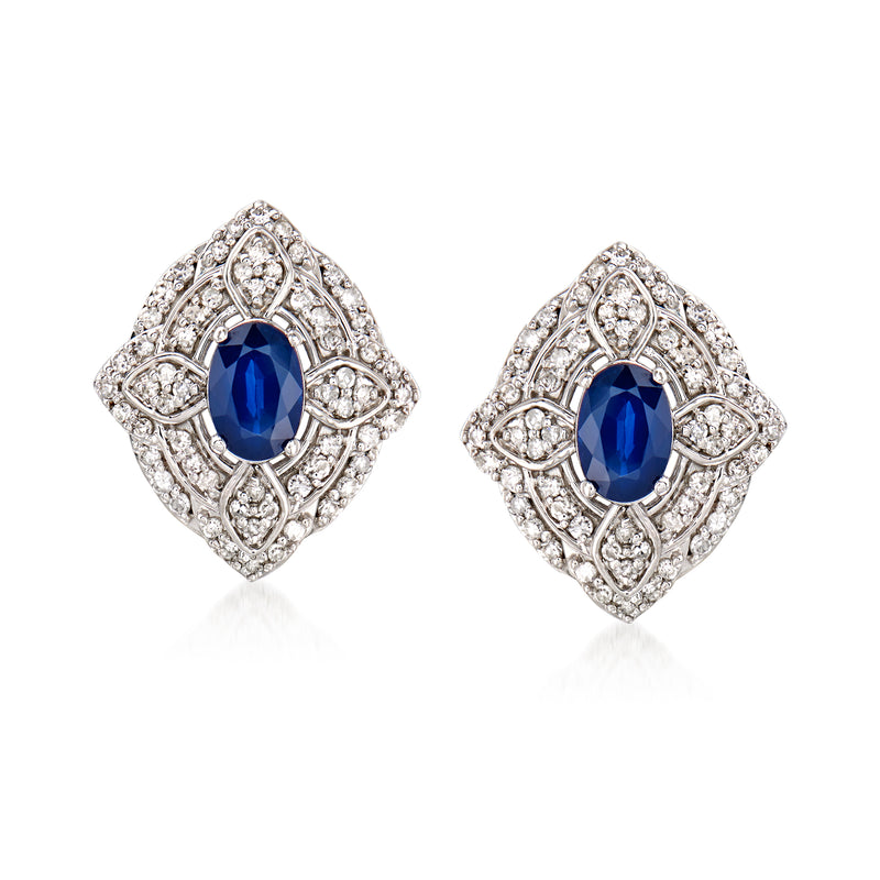 White gold sapphire and diamond oval stud earrings with ornate diamond halo