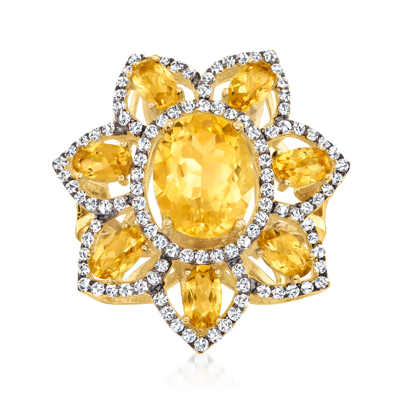 Citrine and white topaz flower ring with oval yellow center stone in gold over sterling