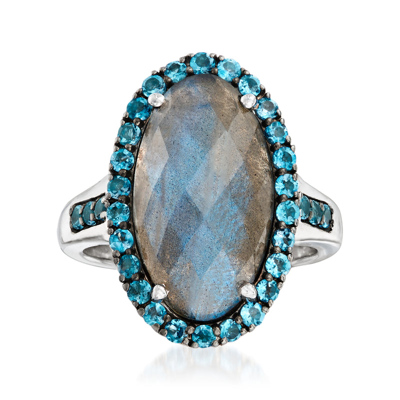 Sterling silver ring with oval labradorite center and London blue topaz halo
