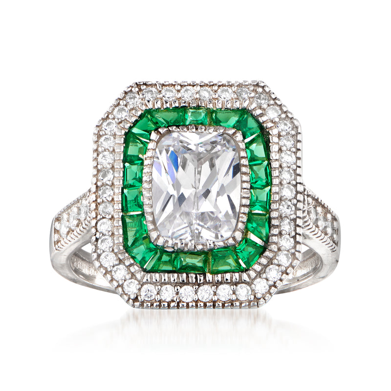 Sterling silver ring with square clear center stone, green side stones, halo CZ