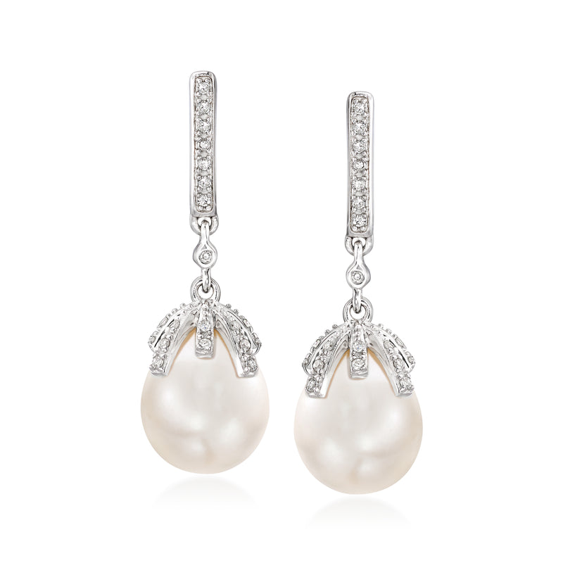 Sterling silver drop earrings with large white cultured pearl and diamond halo details
