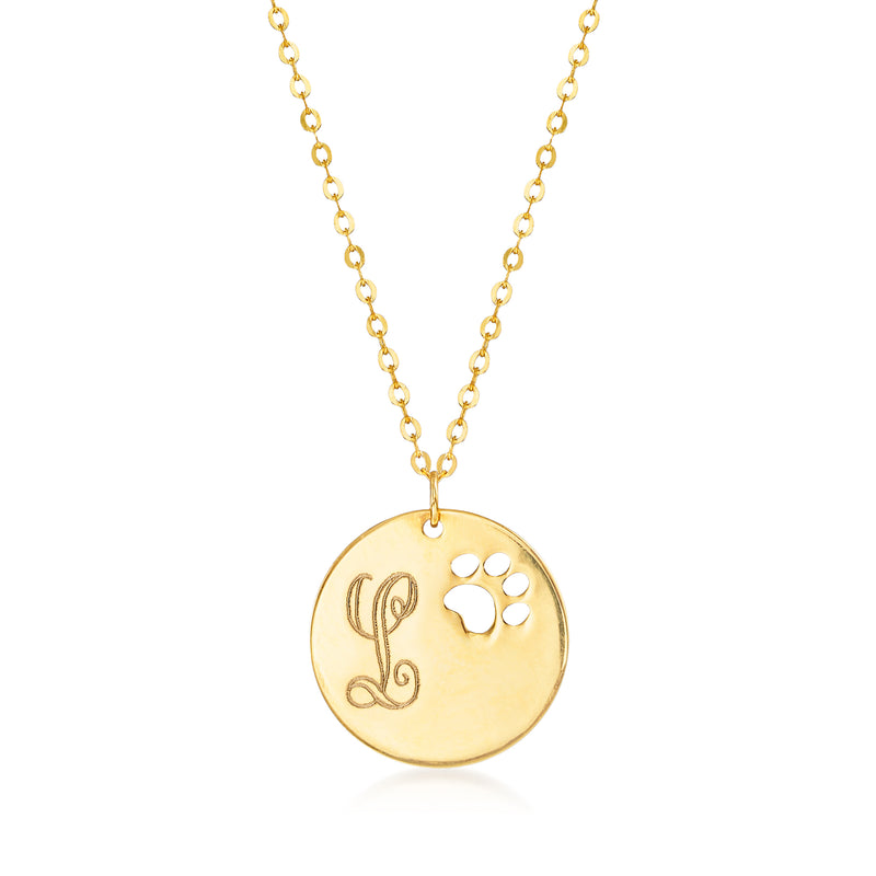 Round yellow gold disc necklace with cut-out paw print and monogram initial