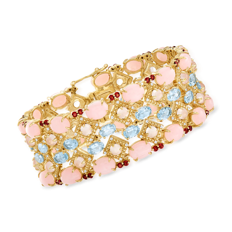 Gold-tone multi-gemstone bracelet with pink oval stones and light blue accents