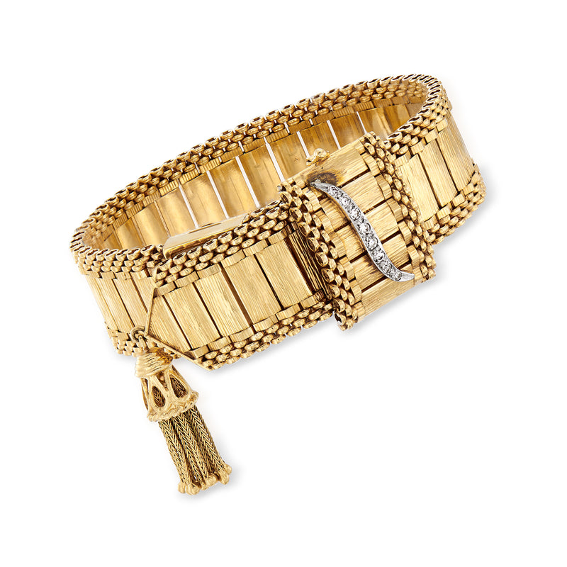 Vintage yellow gold women’s wristwatch with diamond bezel and dangling tassel