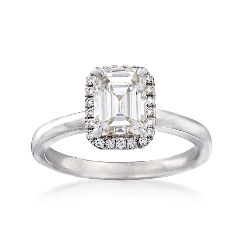 18kt white gold diamond halo ring with emerald-cut center stone