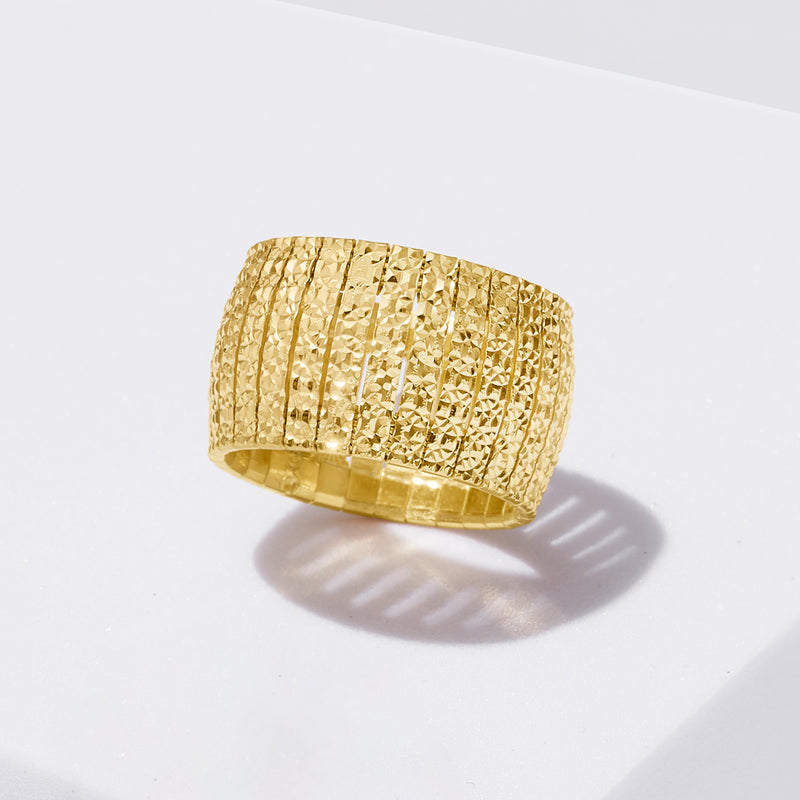 Cleopatra ring side view, textured wide band in yellow gold over sterling silver
