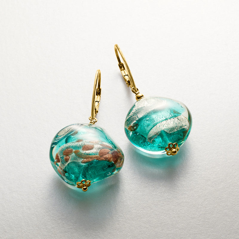 Turquoise Murano glass drop earrings with gold leverback hooks and bead detail.