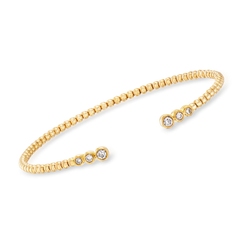 14kt yellow gold diamond cuff bracelet with three round bezel-set stones