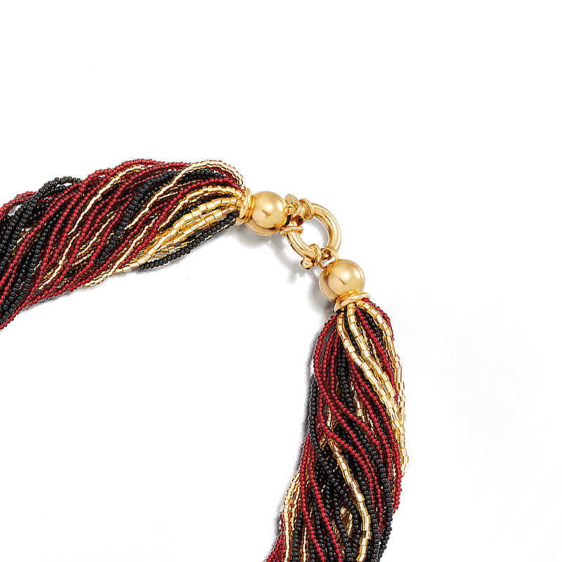 Close-up of gold clasp on red, black and gold Murano glass bead torsade necklace