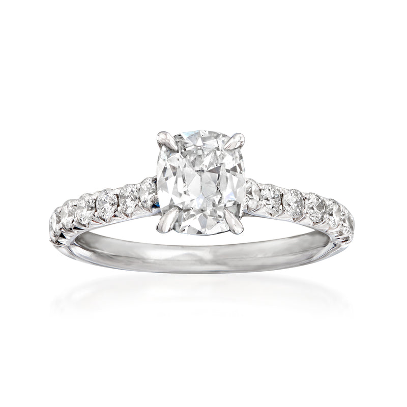18kt white gold diamond engagement ring with brilliant center stone and pave band