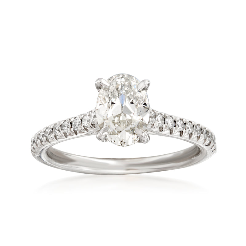 14kt white gold diamond engagement ring with oval center stone and side melee accents