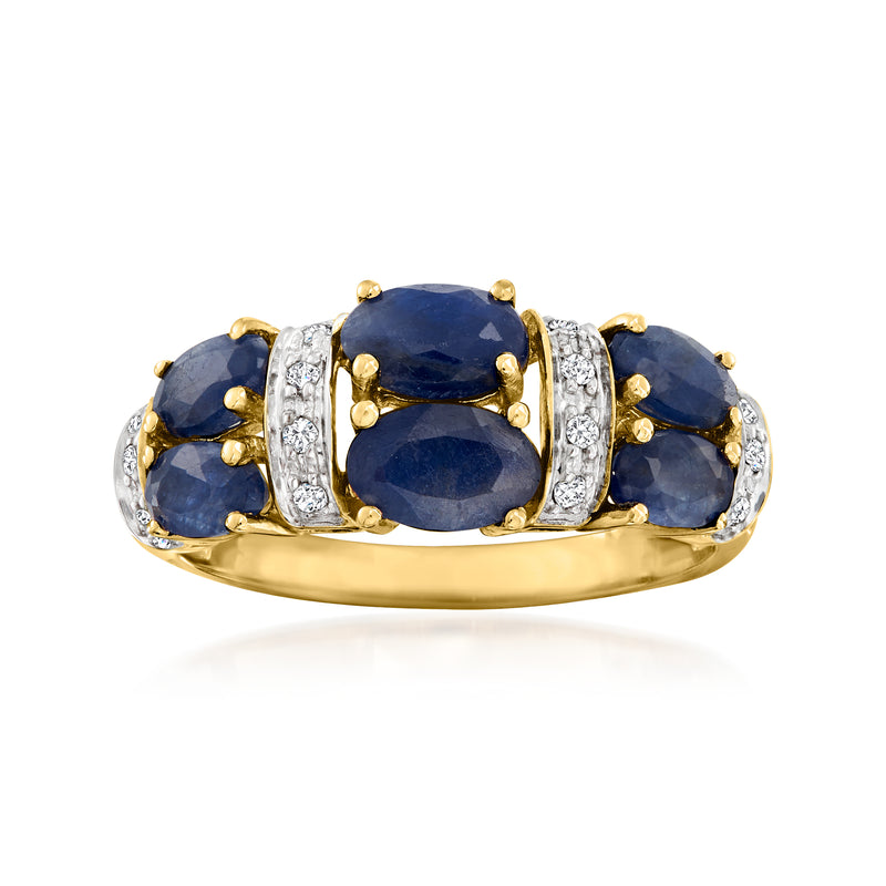 14kt yellow gold sapphire ring with three oval blue stones and diamond side accents