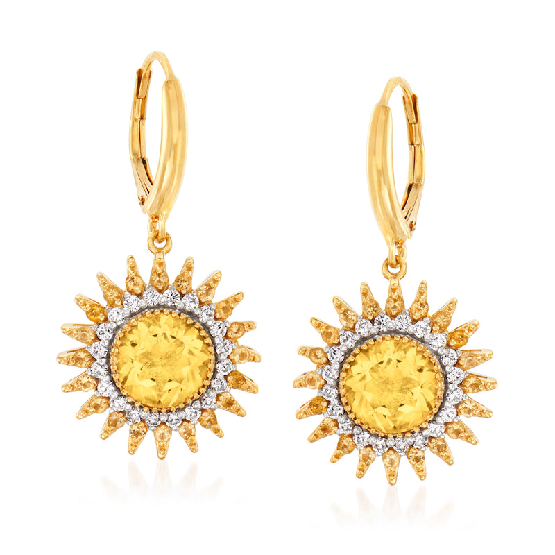 Gold-tone sun drop earrings with citrine center, diamond halo, leverback closures.