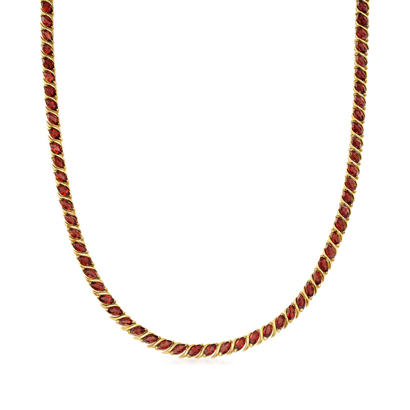 Garnet tennis necklace in yellow gold over sterling silver, oval red gemstones.