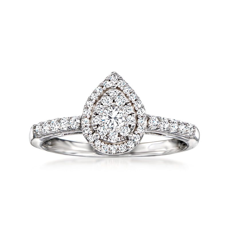 Pear-shaped diamond cluster ring in sterling silver with round halo stones