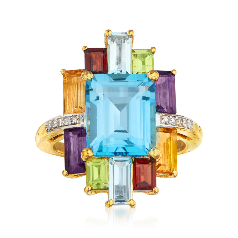 Multigemstone ring in gold with large sky-blue center stone, colored side stones, diamond accents