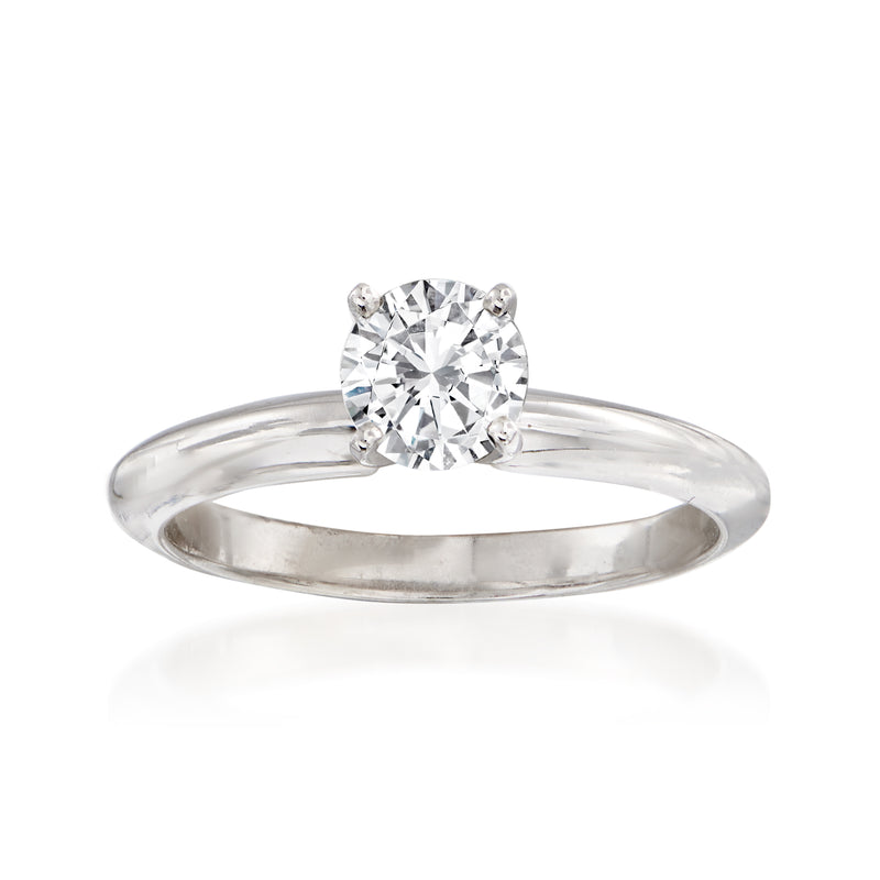 14kt white gold solitaire diamond ring with round center stone, four-prong setting