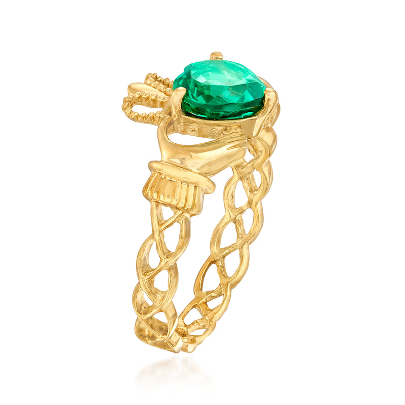 Gold-tone claddagh ring with large oval green simulated gemstone top view