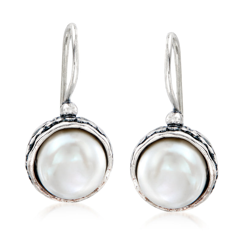 Sterling silver drop earrings with round cultured pearl in textured bezel
