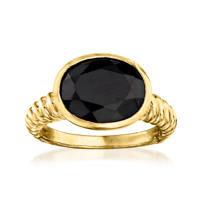 Gold over sterling ring with black onyx oval center and twisted rope band