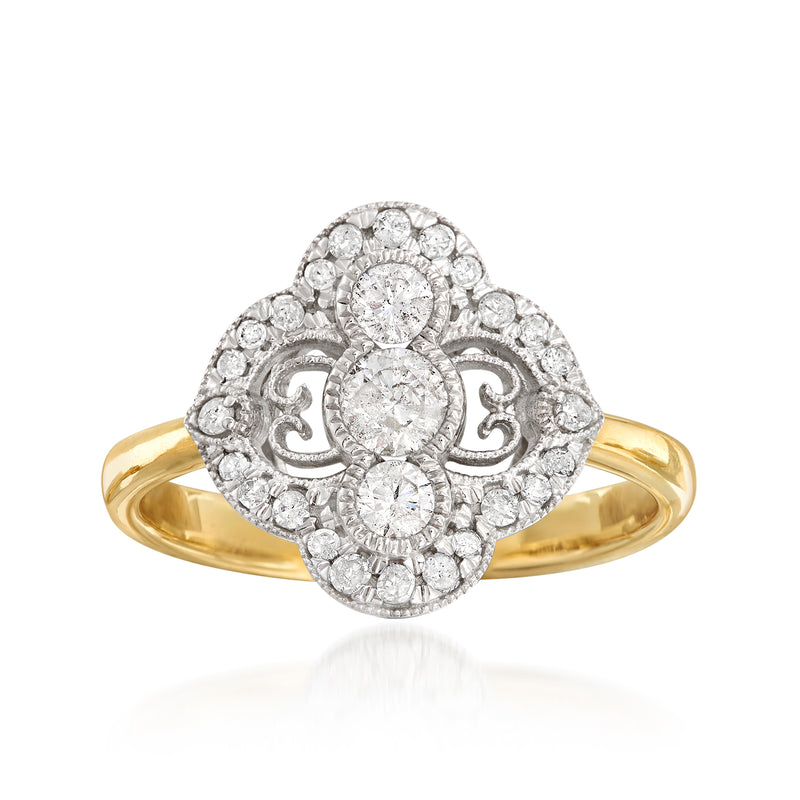Two-tone gold diamond ring with oval center and round halo design