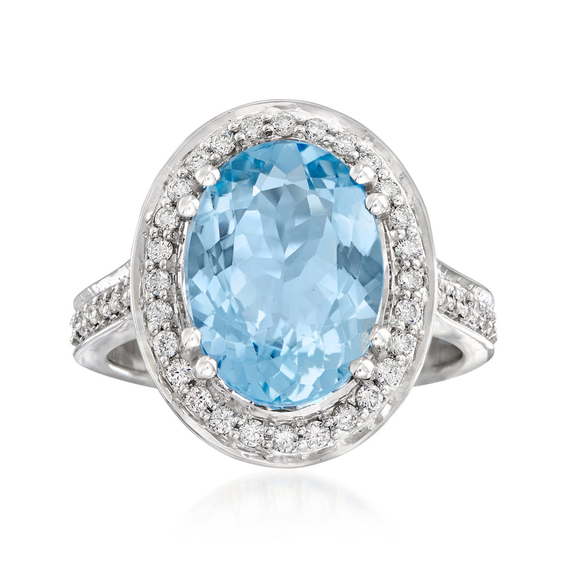 Aquamarine and diamond ring in 14kt white gold with oval halo setting