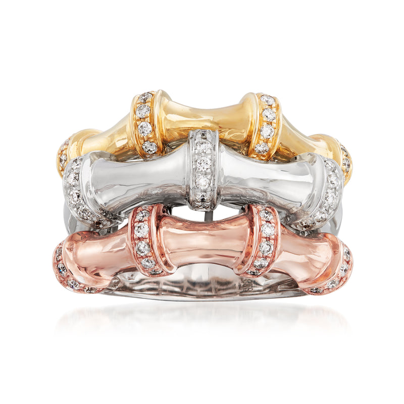 Tri-colored gold three-row diamond ring with raised bands and sparkling stones