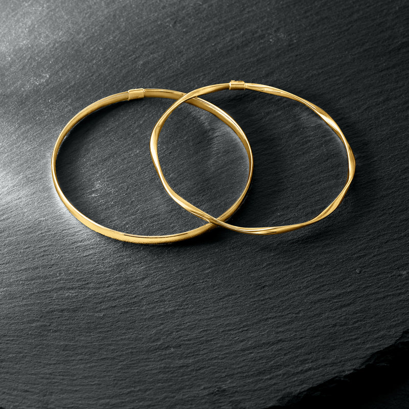 14kt yellow gold twisted bangle bracelet, two round cuffs shown