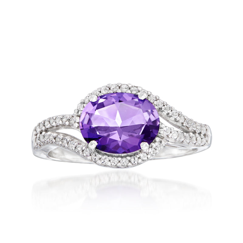 Sterling silver ring with oval purple center stone and pavé accents