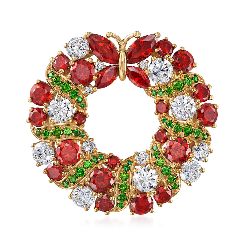Christmas wreath pin with red, green, and clear stones in gold-tone setting
