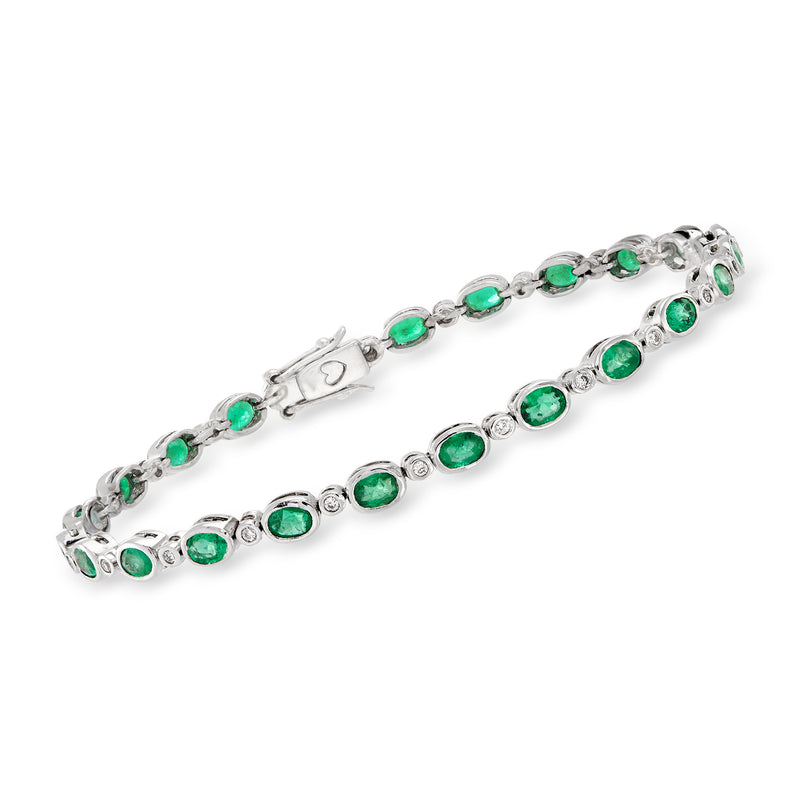 14kt white gold tennis bracelet with oval emerald-green stones and small diamonds