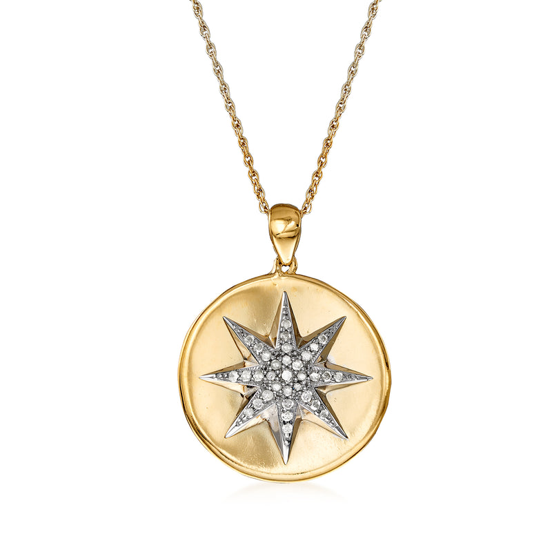 Gold-tone starburst pendant necklace with sterling silver diamond-look center