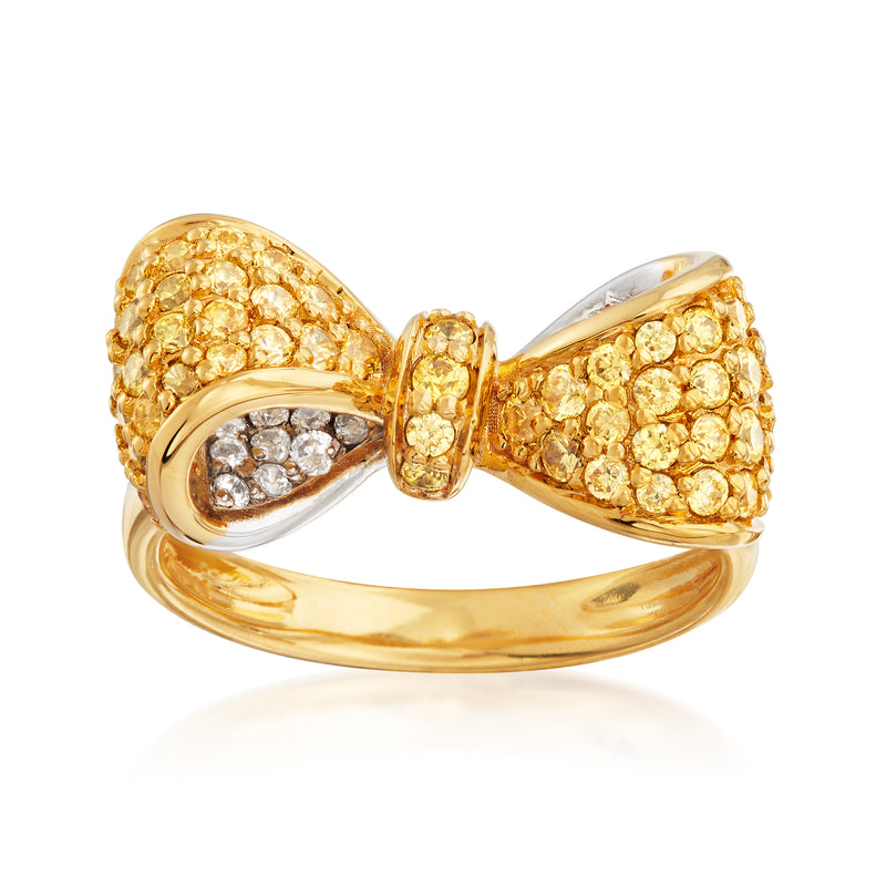 Gold bow ring with yellow CZ stones and small white CZ accents in sterling silver