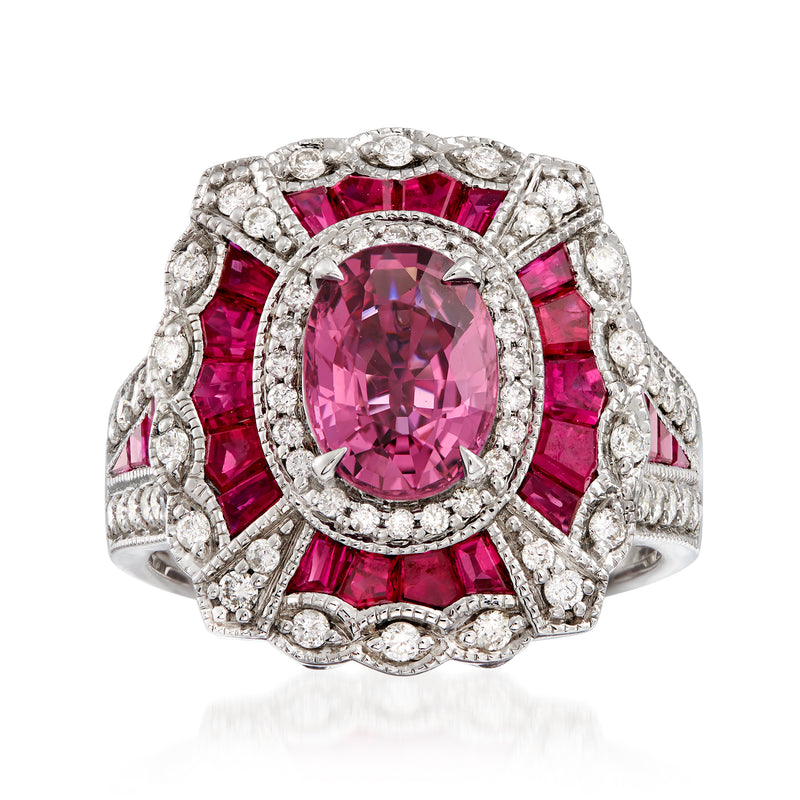 14kt white gold ring with oval pink sapphire center, ruby side stones, diamond halo