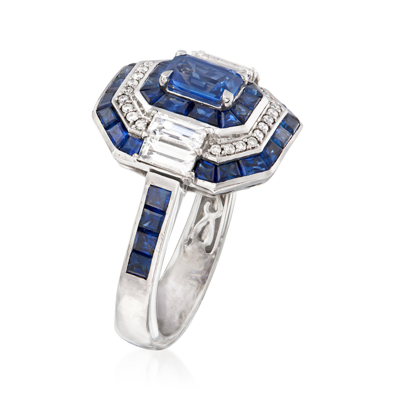 White gold ring with blue cushion sapphire, diamond halo, baguette side accents