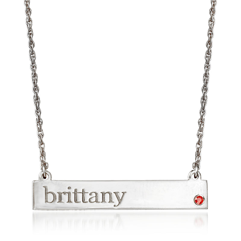 Sterling silver name necklace with engraved 'brittany' bar and red birthstone