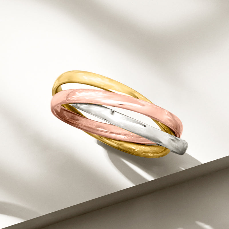 Tri-color 14k gold rolling ring with yellow outer band, rose middle, and white inner stripe